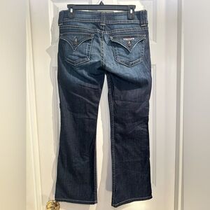Size 28 women’s Hudson Jeans with buttons on back pockets.